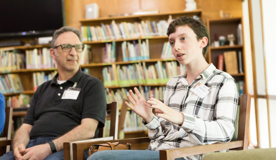 Young man speaking in a group